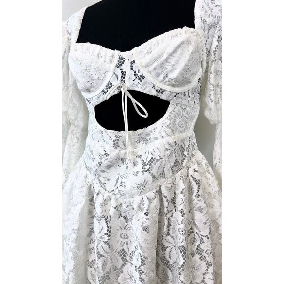 For Love & Lemons Frances Puff Sleeve Mini Dress in White Small Floral Cutout - Picture 4 of 5